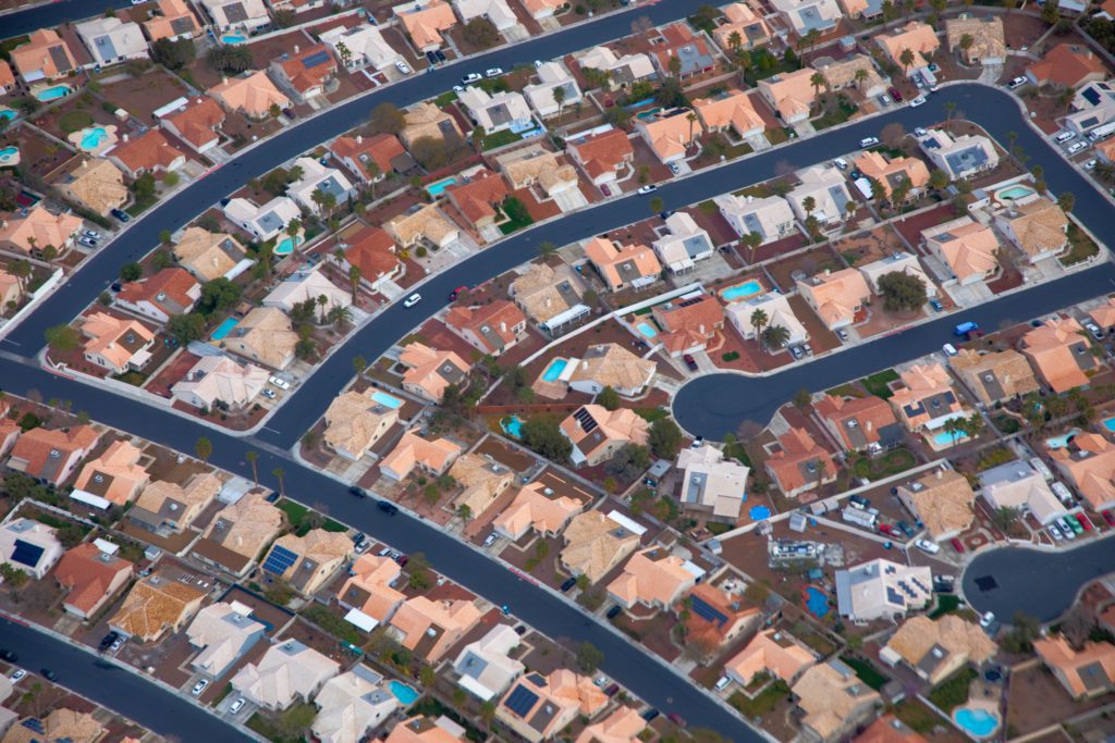 aerial shot of suburbs | When It Comes to Real Estate Investments... What's a good deal?