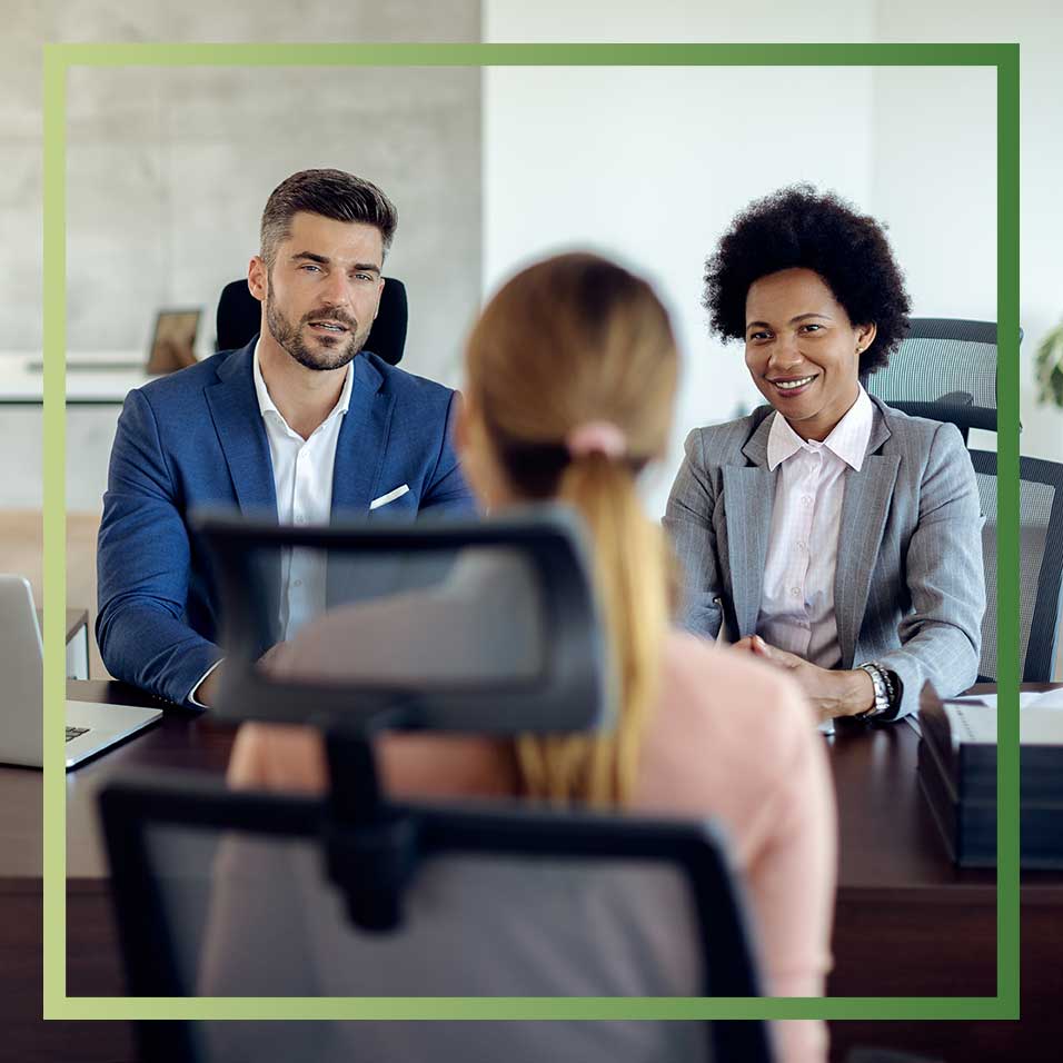 business-colleagues-having-job-interview-with-potential-candidate-office | VRM Mortgage Services | REO Asset Management | VRM Mortgage Services